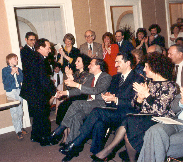 Italian General Consul Dr. G. M. Tagliavia is congratulating Michelangelo Verso
