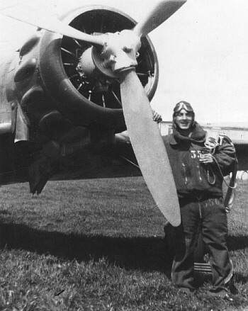 M. Verso in front of the fighter 'MACH 202'